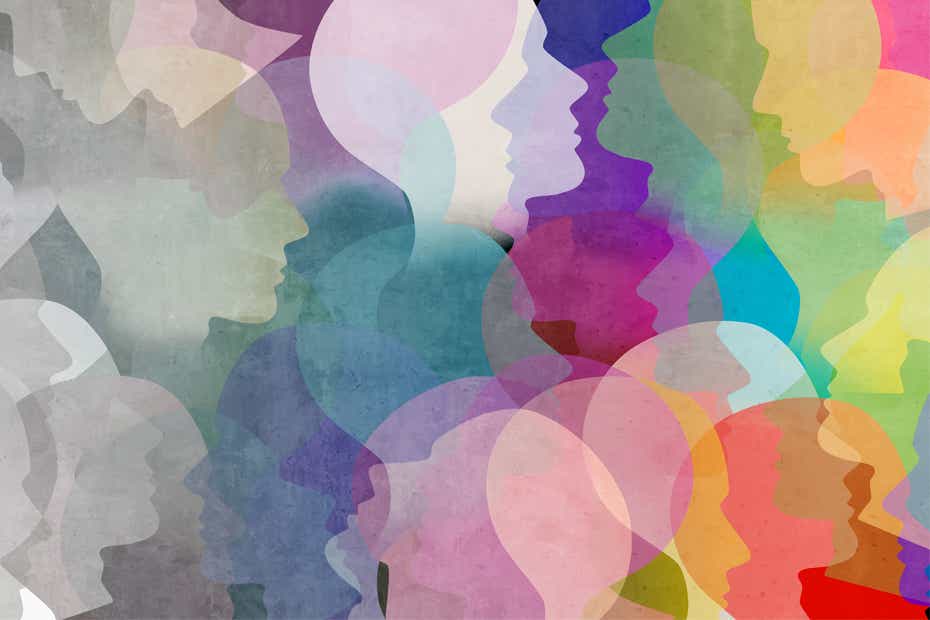 An illustration of faces in many different colours and in black and white